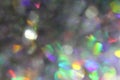 Blurred abstract creative background. Gray and rainbow background. Lens flare. Colorful bokeh light. Illuminated burst Royalty Free Stock Photo