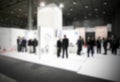 Blurred abstract trade show, intentionally blurred background