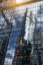 Blurred abstraction. Abstract reflection of geometric shapes with a glass building