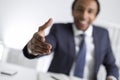 Blurred African American man stretching hand Royalty Free Stock Photo