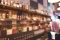 Blurred back bar. Bottles of spirits and liquor at the bar. Blurred desk in bar. Royalty Free Stock Photo