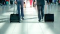 Blurred back side of 2 business man walking in airport terminal with flare light effect and copy space