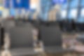 Blurred backgound of Airport waiting area. Empty Chairs in a Waiting Room at Airport. modern airport terminal waiting room Royalty Free Stock Photo