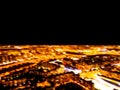 Abstract Blurred background Aerial night view of a big city. Cityscape panorama bokeh at night. Blurry Aerial view of skyscraper a Royalty Free Stock Photo