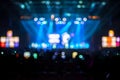 Blurred background : Bokeh lighting in concert with audience ,Music showbiz concept Royalty Free Stock Photo