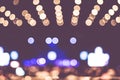 Blurred background : Bokeh lighting in concert with audience ,Music showbiz concept Royalty Free Stock Photo