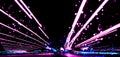 Blurred background with Cars light trails on a curved highway at night. Night traffic trails. Motion blur. Night road with traffic Royalty Free Stock Photo