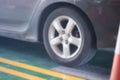 Blurred background of check wheel alignment in workshop