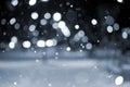 Blurred background. City view, lights, falling snow, night, street, bokeh spots Royalty Free Stock Photo