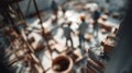 Blurred background of close-up image showcases various construction materials, including bricks and concrete, with workers engaged Royalty Free Stock Photo
