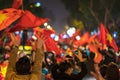 Blurred background of crowd of Vietnamese football fans down the street to celebrate the win after soccer, with a lot of Vietnames