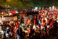 Blurred background of crowd of Vietnamese football fans down the street to celebrate the win after soccer, with a lot of