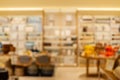 Blurred background of home&decor store in warm yellow key