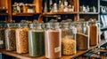 Blurred background of interior in zero waste shop. Customers buying dry goods and bulk products in plastic free grocery store.