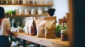 Blurred background of interior in zero waste shop. Customers buying dry goods and bulk products in plastic free grocery store.