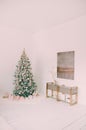 Blurred background. Luxury living room interior with sofa decorated chic Christmas tree, gifts, plaid and pillows. Royalty Free Stock Photo
