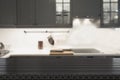 Blurred background. Modern defocused grey kitchen or cafe with wooden tabletop and space for you. Royalty Free Stock Photo