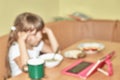 Blurred background of new generation childhood concept.Child with a digital device