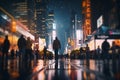 Blurred background of the night city, busy street, illuminated buildings and skyscrapers