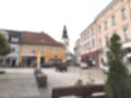 Blurred background of old town square. Defocused abstract scene of city buildings Royalty Free Stock Photo
