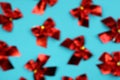 Blurred background red bows on a blue background texture Royalty Free Stock Photo