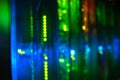 Blurred background of server hardware for web domain hosting provider operation, bokeh of lamps of computers and network routers Royalty Free Stock Photo