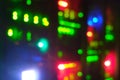 Blurred background of servers of it companies and mobile operators, bokeh of lights of computers and network routers