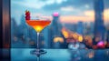 Blurred background of strawberry martini cocktail on a roof top bar background. A cocktail glass of red alcohol Royalty Free Stock Photo