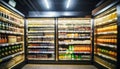 Blurred background of supermarket fridge with bottles of beverages on shelves. Glass showcase Royalty Free Stock Photo