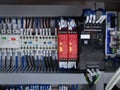 Blurred Background of Switches and Wiring Inside of Electrical Control Cabinet Royalty Free Stock Photo