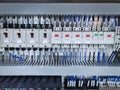 Blurred Background of Switches and Wiring Inside of Electrical Control Cabinet Royalty Free Stock Photo