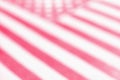 Blurred Background With USA Flag. Light Red Tinted Stars And Stripes. American Independence Day Backdrop. July 4 And Flag Day