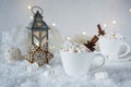 Blurred background of winter frost and Christmas chocolate spice beverage with cookies