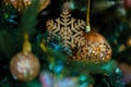 Blurred balls and golden snowflake with colorful bokeh on a dark green background. Royalty Free Stock Photo