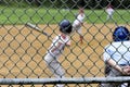 Blurred Baseball Game Through Backstop