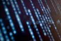 Blurred blue binary code lines in diagonal motion, creating a futuristic digital background ideal for AI, data science, Royalty Free Stock Photo