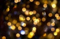 Blurred bokeh background, light effect, glitter, flaming lights, holiday, yellow circles on black, Christmas, fun