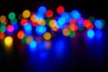 Blurred christmas lights on dark background Royalty Free Stock Photo