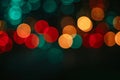 Blurred bokeh circle lights. Abstract colorful gradient green, yellow and red glitter sparkle background Royalty Free Stock Photo