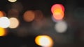 Blurred bokeh of city lights moving