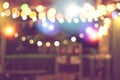 Blurred bokeh night lights in restaurant, abstract image of night festival, background party blur celebration concept