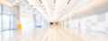 Blurred bokeh panoramic banner background of exhibition hall or convention center hallway. Business trade show event