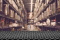 Blurred boxes on rows of shelves. Royalty Free Stock Photo