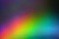 Blurred bright diagonal rainbow light refraction overlay effect for mockups. Organic diagonal holographic flare on a light wall Royalty Free Stock Photo