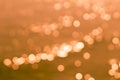 Orange color background with blurred lights and bokeh