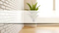Blurred bright room with a white brick wall a plant by the window and a translucent white overlay for text Royalty Free Stock Photo