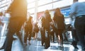 Blurred business people at a trade show floor Royalty Free Stock Photo