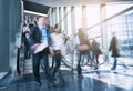 Blurred business people at a trade show staircases