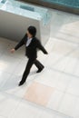 Blurred businesswoman walking