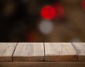 Blurred cafe restaurant club background with wooden table. Place under the text. Empty place. Interer cafe Royalty Free Stock Photo